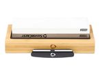 Whetstone set with a bamboo base and sharpening guide, featuring 1000 and 6000 grit sides.