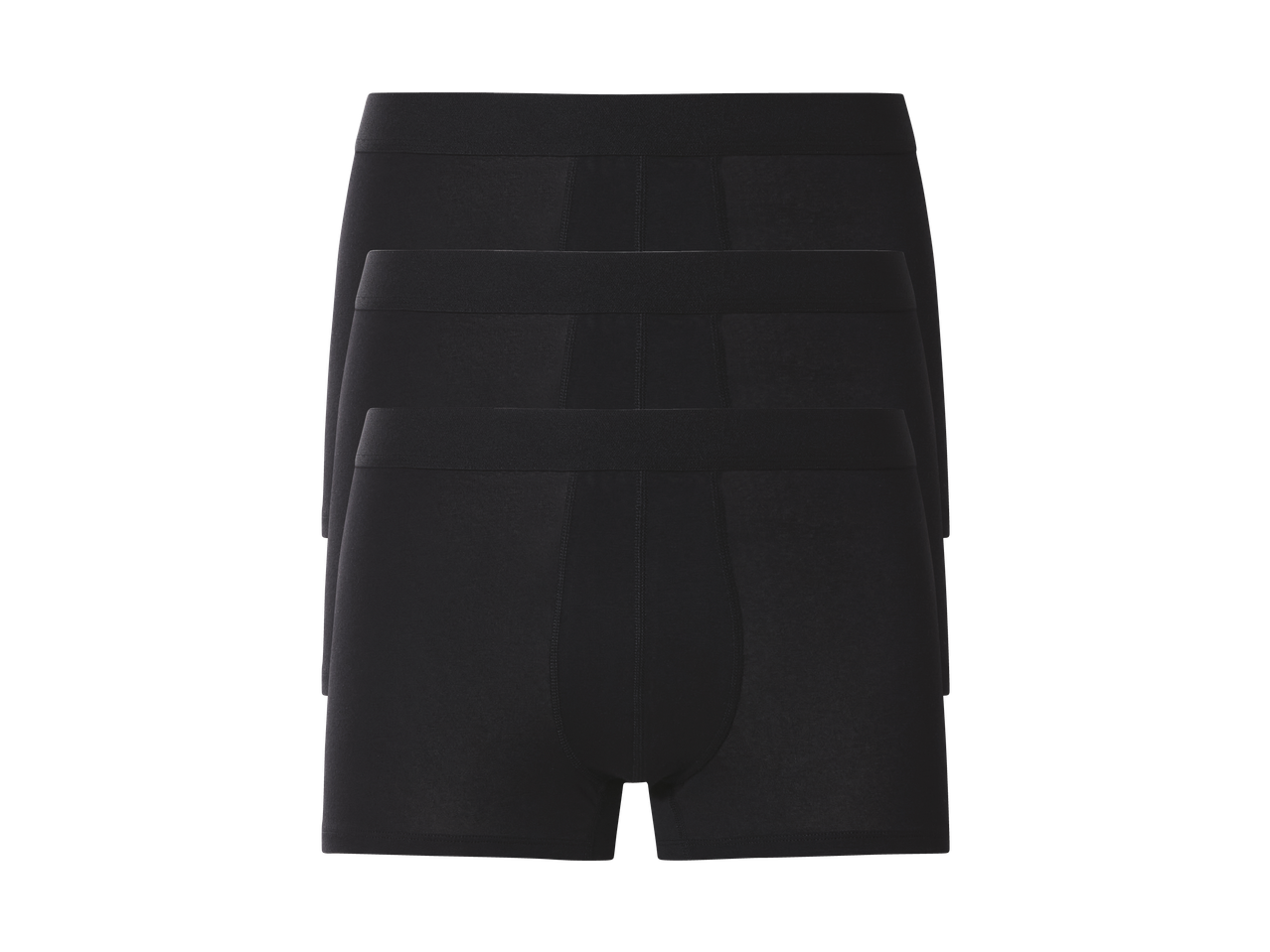 Три чифта черни мъжки боксерки, подредени една зад друга.