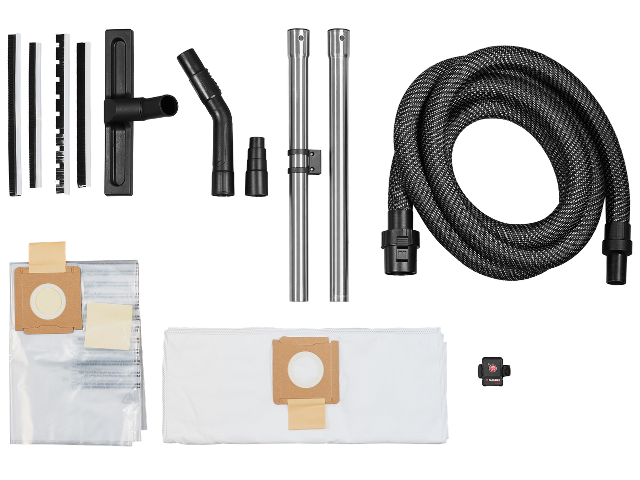 Комплект аксесоари за прахосмукачка, включващ маркуч, тръби, накрайници и торбички за прах.