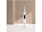 Periuță de dinți electrică Cien Beauty pe un suport de încărcare