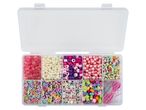 A clear plastic organizer box filled with various colorful beads and craft supplies.