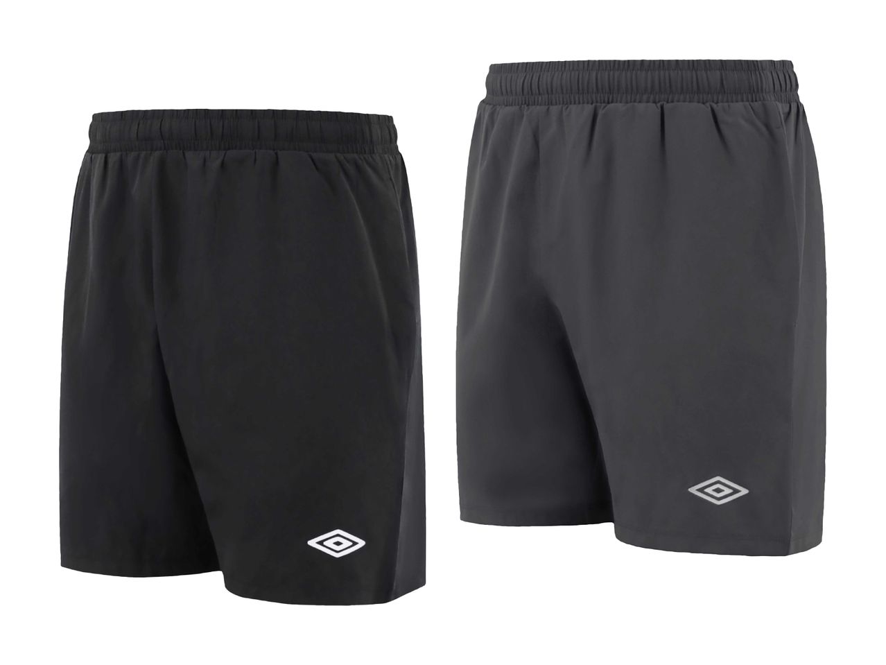To par sportsshorts i sort og mørkegrå med elastik i taljen og et hvidt logo på benet.
