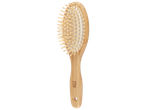 Brosse à cheveux ovale en bambou avec picots en bois.