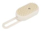 Electric pet grooming brush with soft silicone bristles and a handle