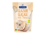 Belbake wit glazuur voor bakken, met twee donuts en een Nutri-score E label.
