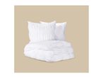White ruched bedding set with a folded duvet and two pillows