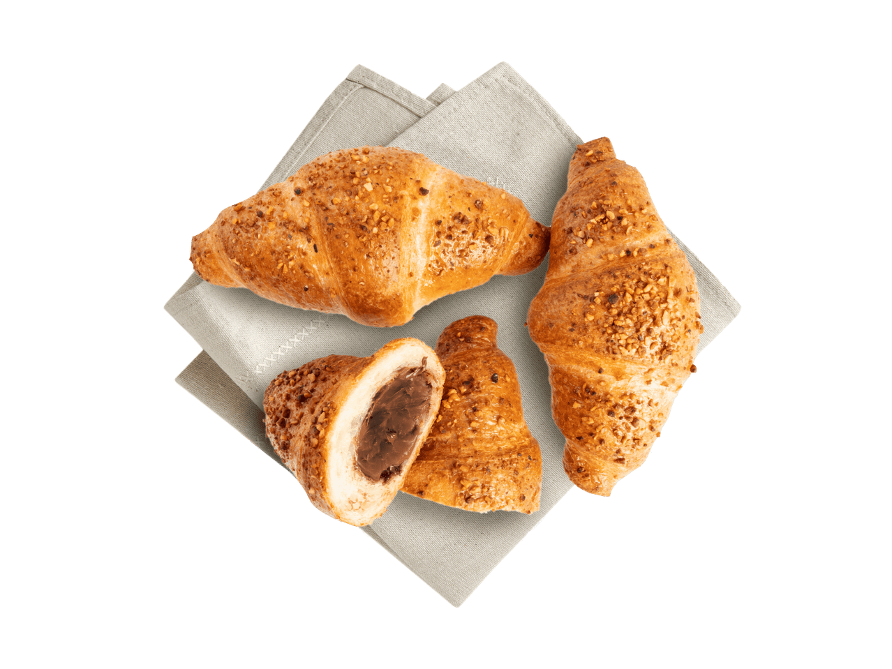 Drei Croissants mit Nussstreuseln, eines davon mit Schokoladenfüllung, auf einem Tuch.