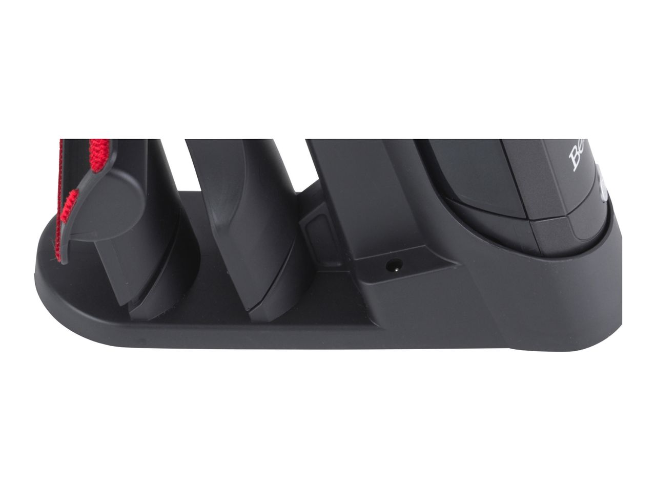 Close-up of a black, three-slot knife sharpener.