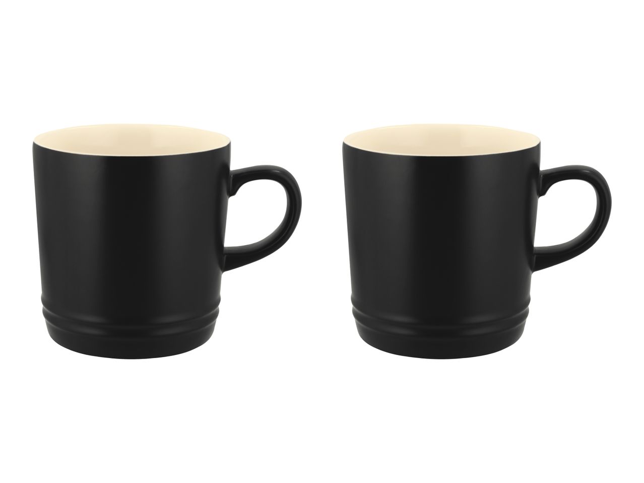 Two black mugs with cream-colored interiors, side by side on a white background.