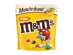 Peanut chocolate candies in a yellow sharing bag.