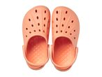 Pair of peach-colored clogs with ventilation holes, seen from above.