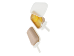 Two frozen popsicles in silicone molds, one yellow and one brown, with their lids open.