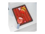 Toy barbecue grill with a skewer of wooden play food including meat and vegetables.