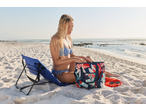 Woman in bikini on beach with CRIVIT cool bag and blue beach chair.