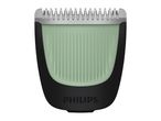 Green and black hair clipper attachment with metal teeth