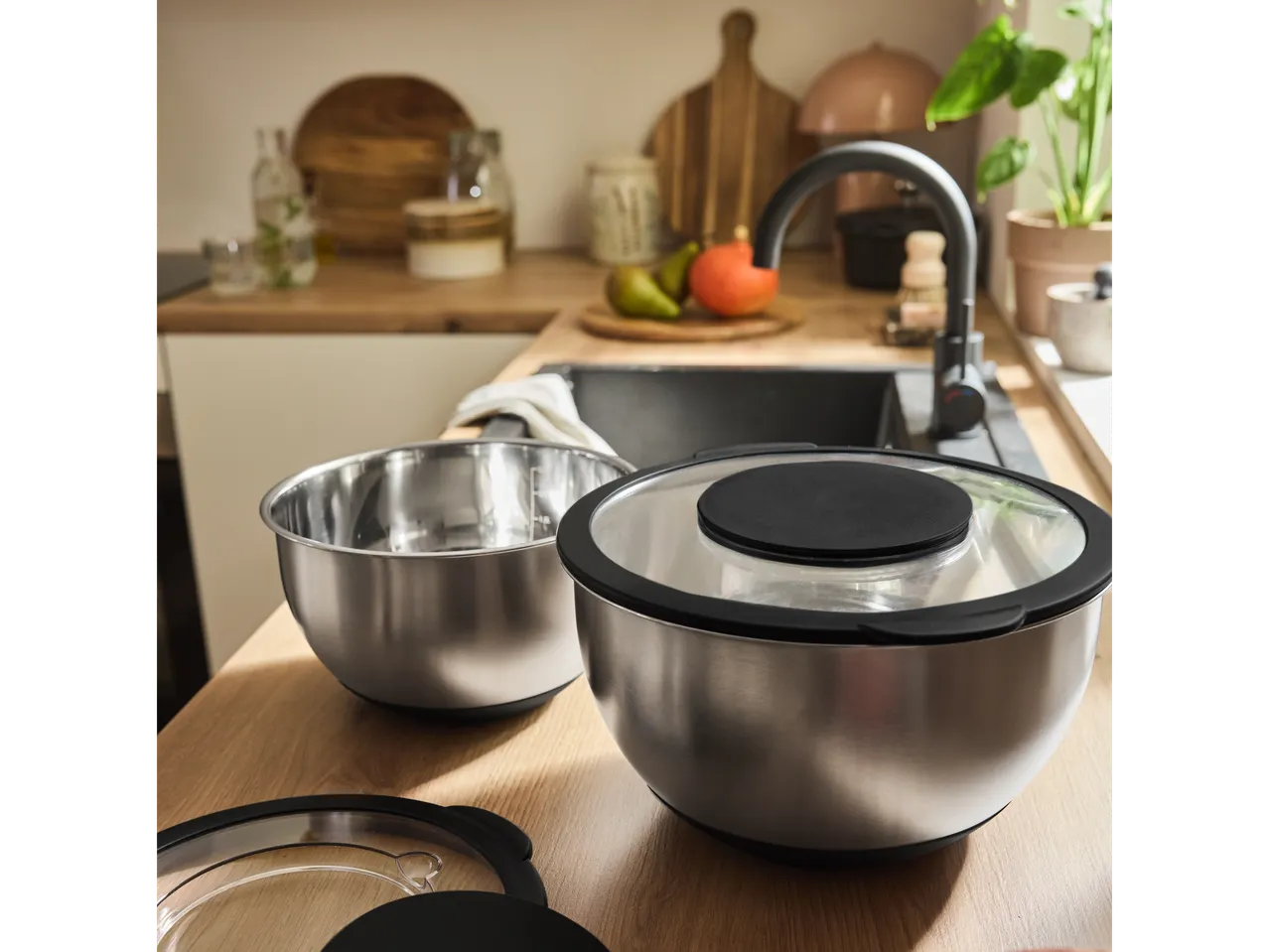 SILVERCREST® Bowl Set with Lids on a kitchen counter.