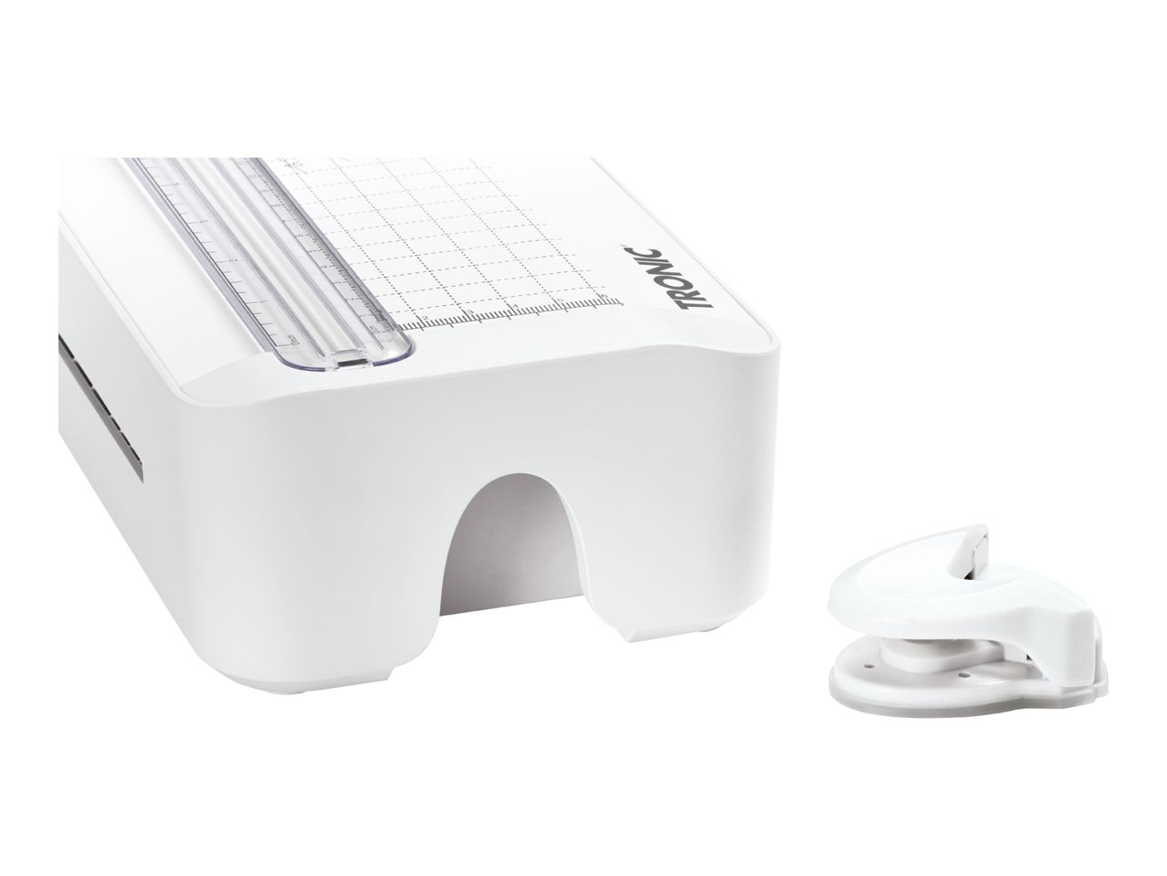 White paper trimmer with a ruler and grid, next to a white corner rounder.