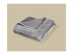 Folded grey weighted blanket with a soft quilted cover