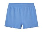 Lyseblå, korte, flossede shorts.