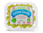 Een plastic bakje met groene pitloze druiven, met een label dat de druiven als 'Cotton Candy' beschrijft.