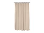 Beige shower curtain with a textured waffle weave pattern, hanging from a silver rod.