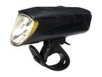 Black bicycle headlight with a clear lens and a rubber strap mount, illuminated.