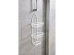 White three-tiered shower Rack hanging on a shower door.