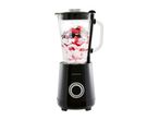 Black blender with a glass jug filled with yogurt and berries