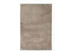 Rectangular beige bath mat with a textured, plush surface