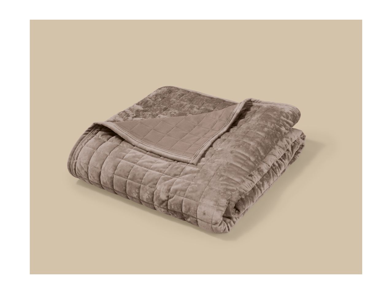 Folded brown quilted weighted blanket