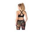 Woman from behind wearing a black sports bra with criss-cross straps and patterned leggings.