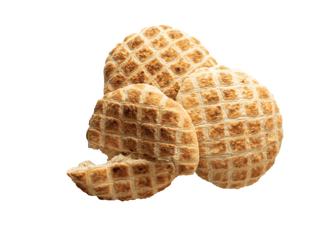 Keturios apvalios, grotelių rašto duonos, viena iš jų įkasta.