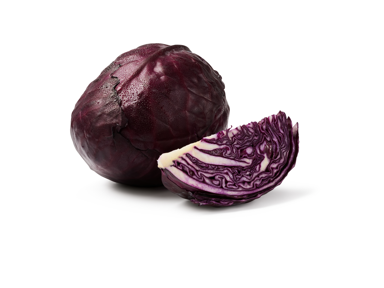 Terve punakapsas ja lõigatud kiil, mis näitab selle elavaid purpurseid kihte.