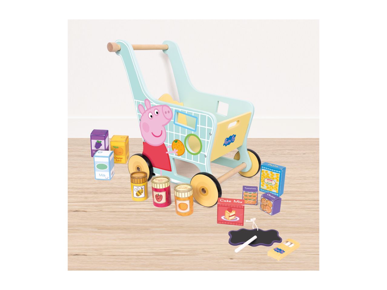 A wooden toy shopping trolley with groceries like milk, juice, jam, cake mix, pasta, and vegetables.