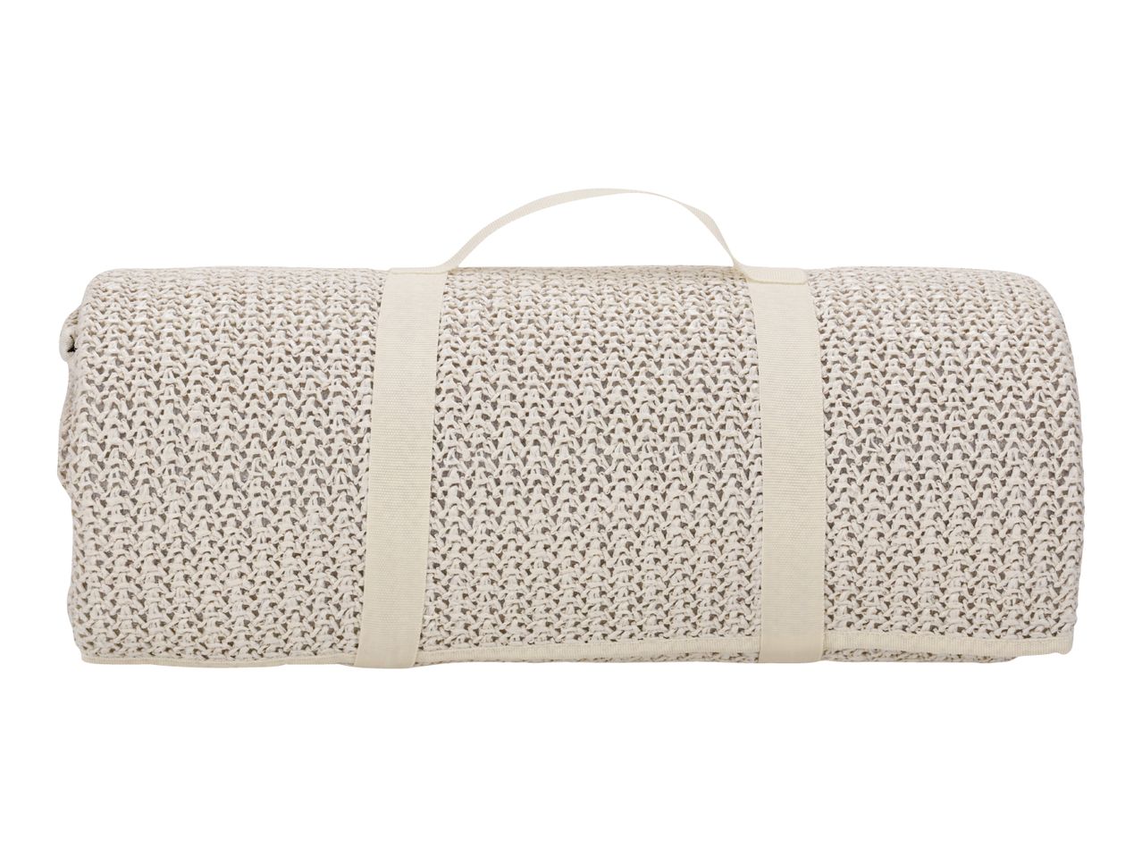Rolled-up cream-colored knitted picnic blanket with carrying straps