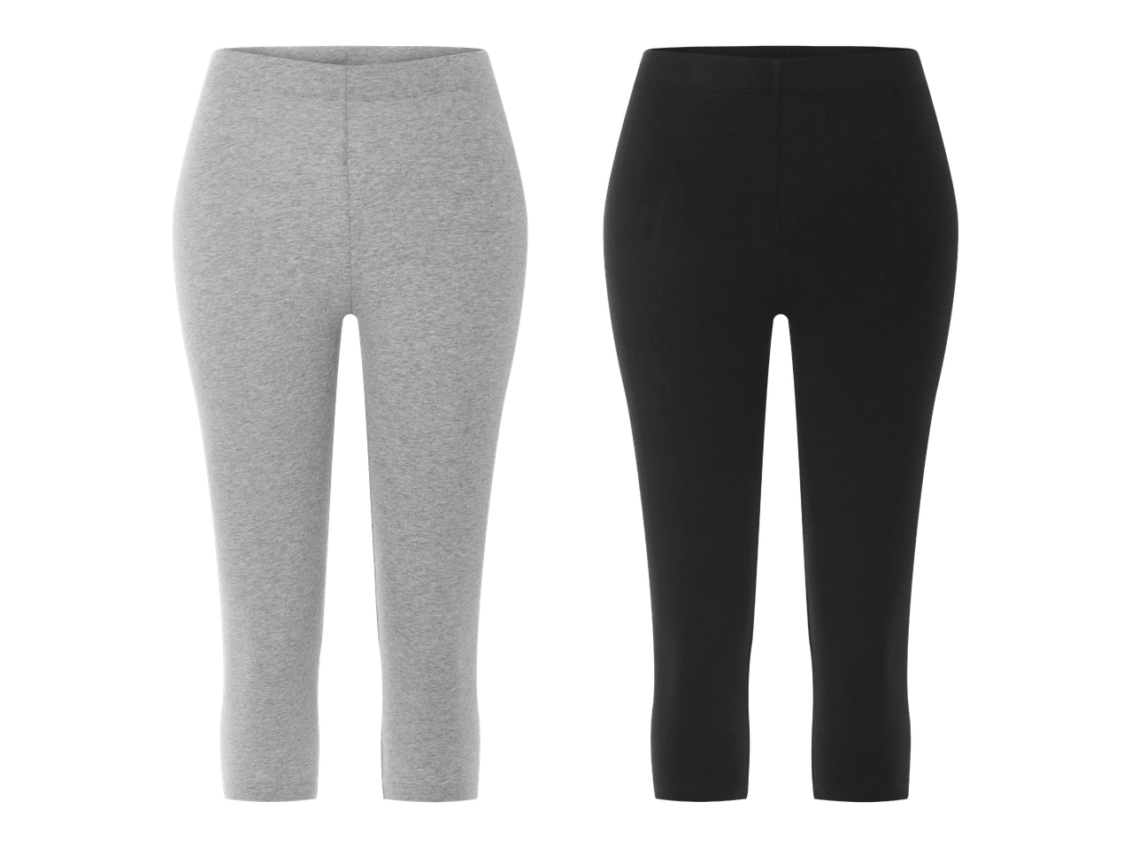 Harmaat ja mustat ¾-pituiset leggingsit.