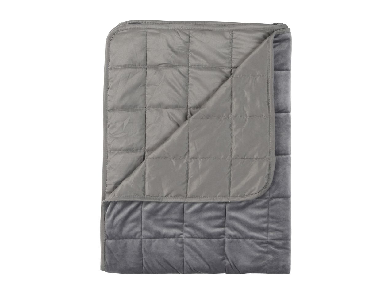 Gray quilted blanket with a folded corner revealing a darker gray, plush underside.