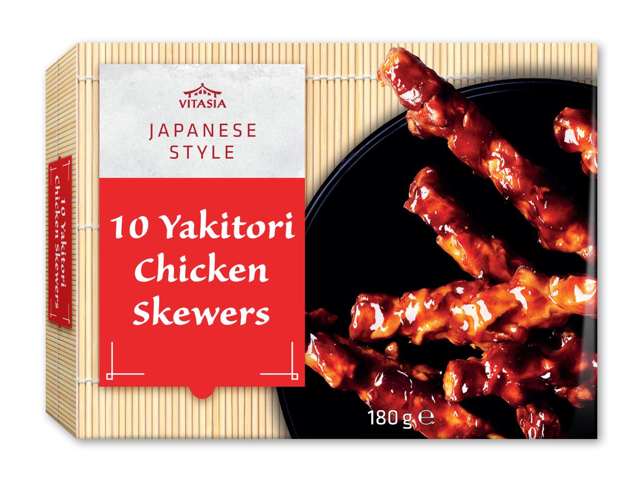 Pakke med 10 yakitori kyllingespyd i japansk stil, serveret på en sort tallerken.