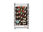 Vanilla flavoured wafer rolls in a black and white patterned package with colorful floral designs.