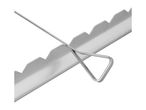 Close-up of a metal cake leveler with a wire cutter and serrated edge.