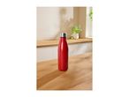 Red insulated stainless steel water bottle on a wooden table.