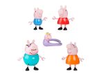 A set of five pig family figures, including two adult pigs, two child pigs, and a baby pig.