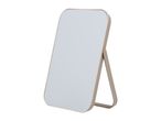 A beige rectangular vanity mirror with rounded corners and a stand.
