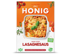 Honig Lasagnesaus mix met een ovenschaal lasagne en tomaten.