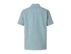 A light blue denim short-sleeved shirt.