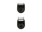 Two black Philips Norelco hair clipper combs.