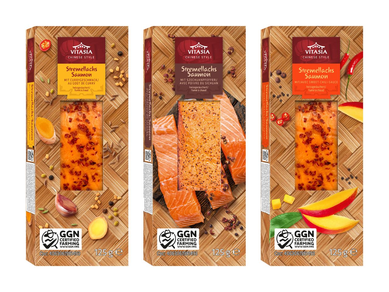 Drei Packungen Vitaasia Räucherlachs in Curry-, Szechuan- und süß-scharfer Chili-Variante.