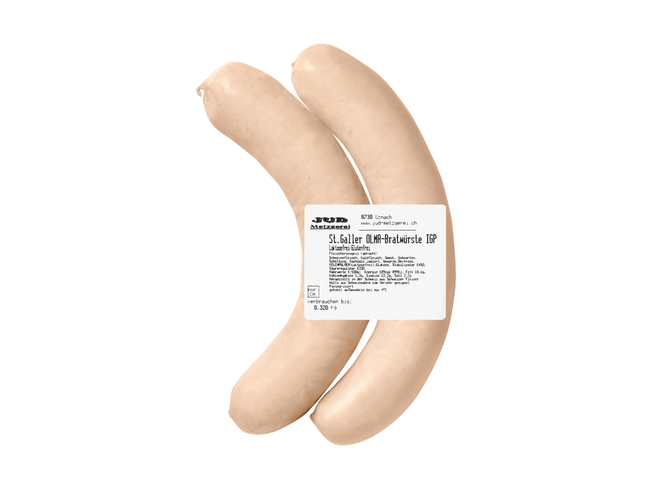 Deux saucisses blanches sur une ardoise avec du persil et des épices.