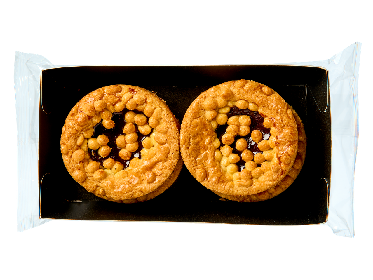 Twee ronde fruittaartjes met rasterpatroon in een zwarte verpakking.
