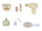 A collection of wooden toy beauty products including makeup, hairdryer, perfume, nail polish, and a brush.